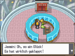 Jasmine beside the recovered Amphy in the relit Olivine Lighthouse in HeartGold