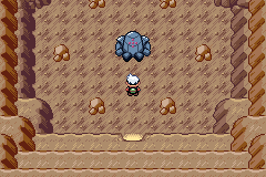 Registeel standing in the middle of the Ancient Tomb chamber with the player one step in front of it