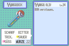 An Olive Level 24 Pokéblock in the Emerald Case shows sweet and sour flavors and Feel 22.