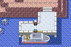 The player on the Faraway Island pier with the S.S. Tidal moored below and stone steps leading up the rocky slope