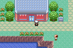 Original Emerald gameplay outside Lilycove Contest Hall, with an arrow pointing to the entrance.