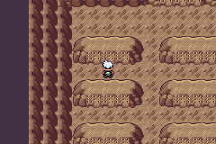 The player standing below one of the Sealed Chamber outer room’s dotted stone tablets