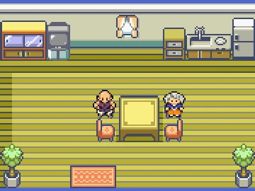 The Berry Master and his wife at their table in the Berry Master’s house on Route 123
